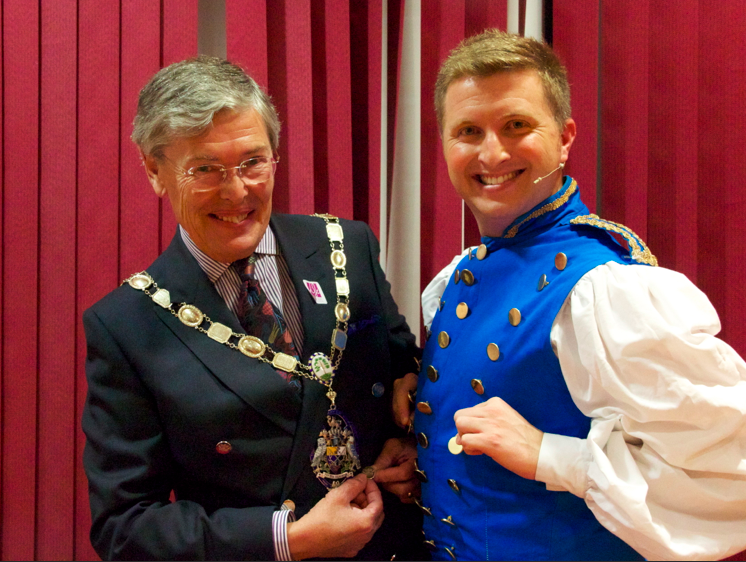 Mayor Tim Dodds and Buttons compare their finery before on press night.