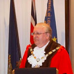 The Mayor in his council chambers.